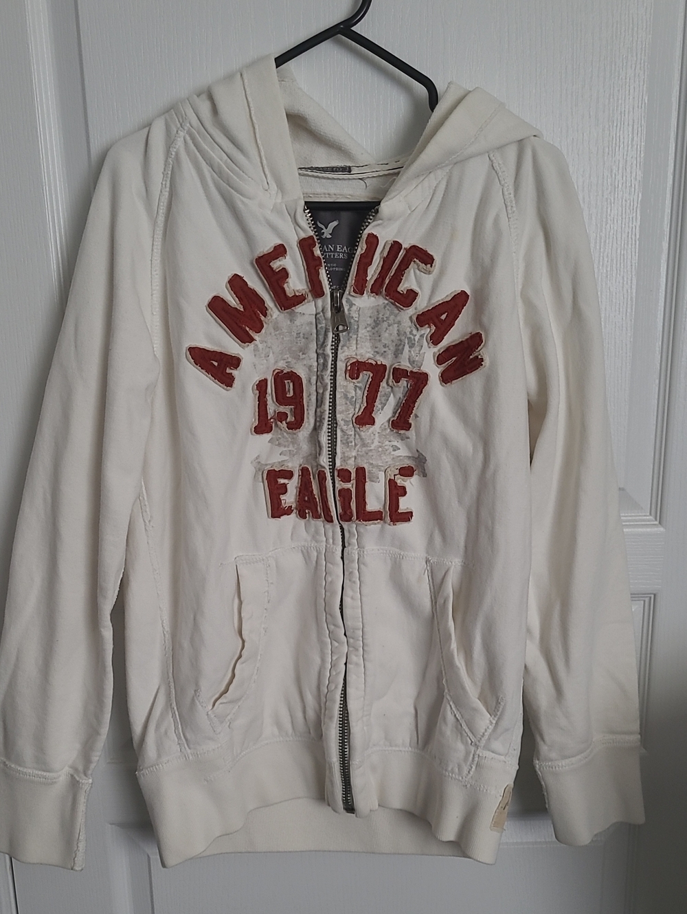 American Eagle Cream Hoodie with Red Appliqué Logo
